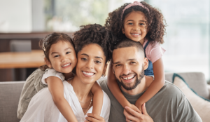 Gen Z black family, mom dad and two young daughters