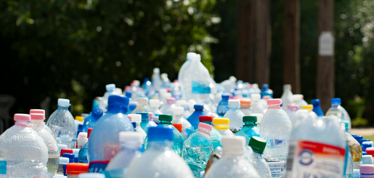 Large pile of plastic water bottles