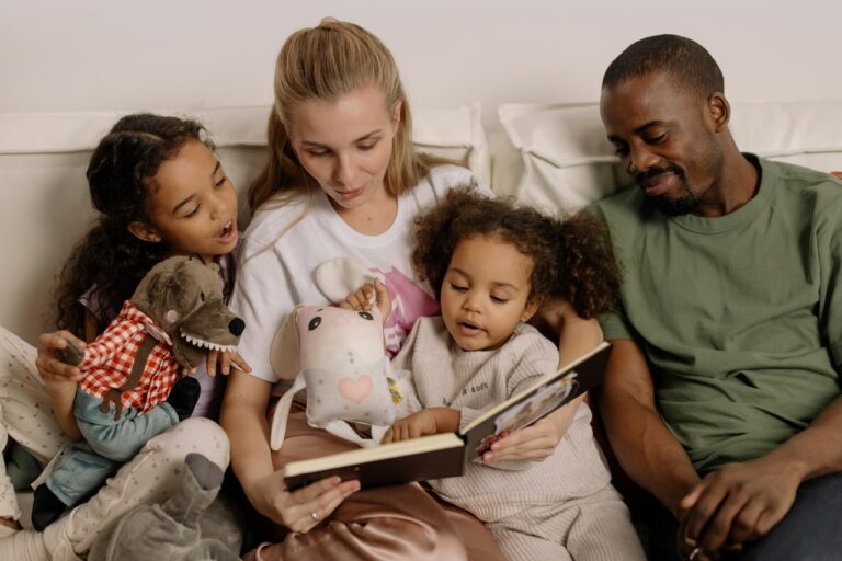 Multicultural family reading together on a couch