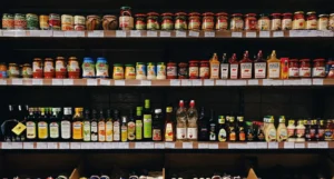 Shelves of liquor behind a bar