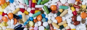 Pile of different colors and styles and sized of pills
