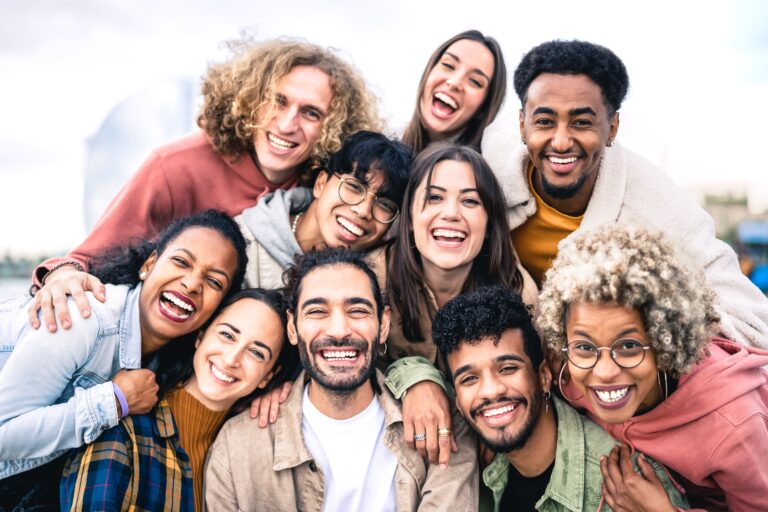 Multicultural Gen Z group of friends outside together