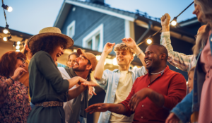 Group of multicultural Gen Z outside at a BBQ